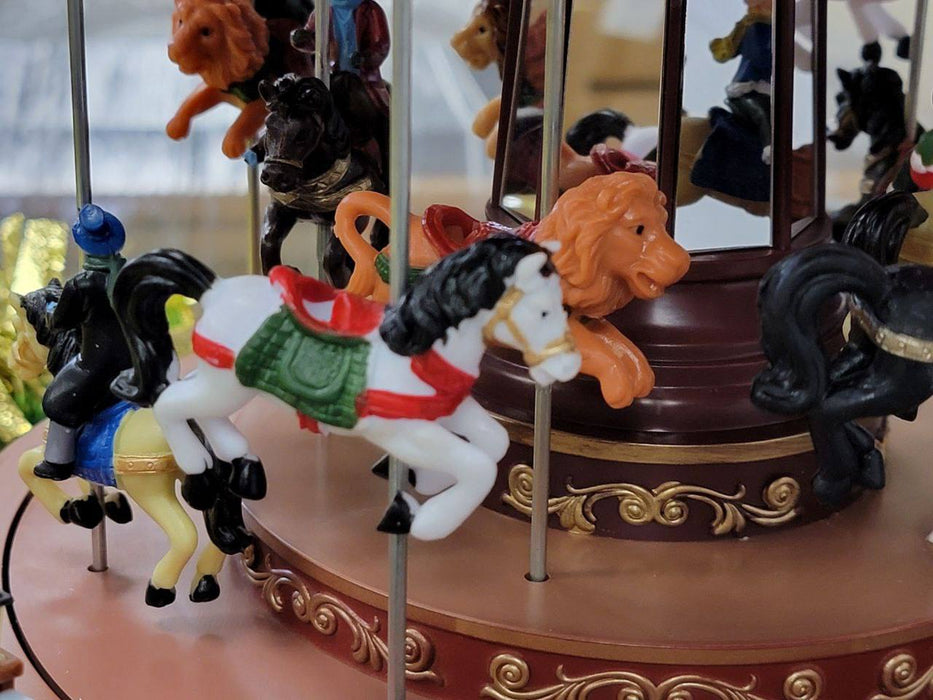 Christmas Carousel Decoration. Animated Christmas Village F07M4-9-W271