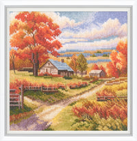Cross-stitched landscape with autumn trees, a house, and a path.