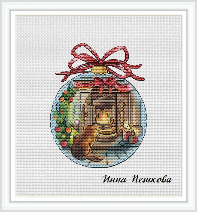 A kitten by the fireplace - PDF Cross Stitch Pattern